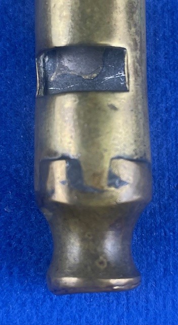 acme tubular whistle close-up showing stamp area and body finish for Model 048 variant