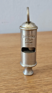 acme round whistle stepped top cap photo showing later Hudson Acme top cap variation circa 1930–1940 (photo credit needed)